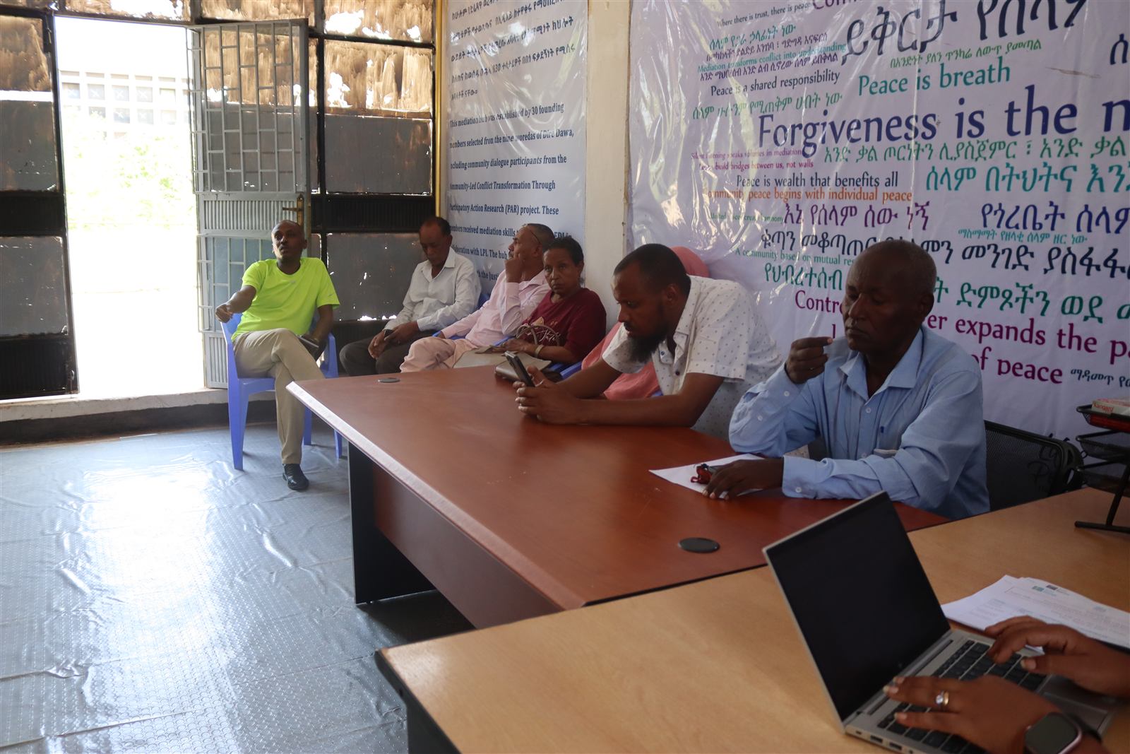 Founding banner on the hub wall describing its 30 founding members from the nine woredas of Dire Dawa